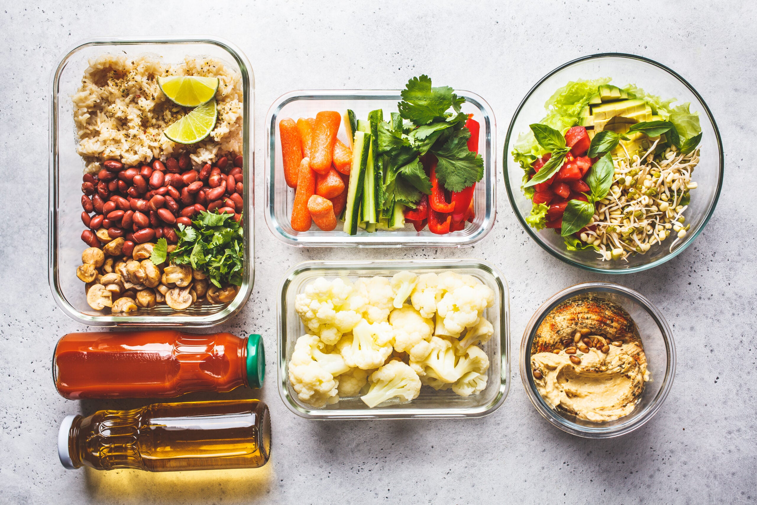 Glass containers of prepped from-scratch staples, seen from above