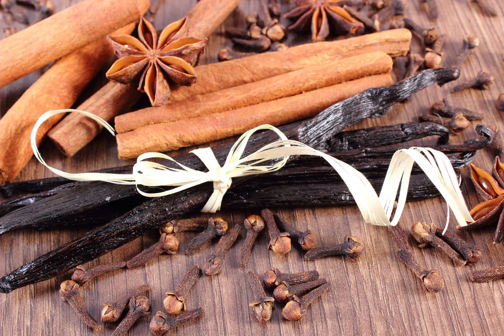 Vanilla beans with cinnamon sticks, star anise and cloves for holiday baking