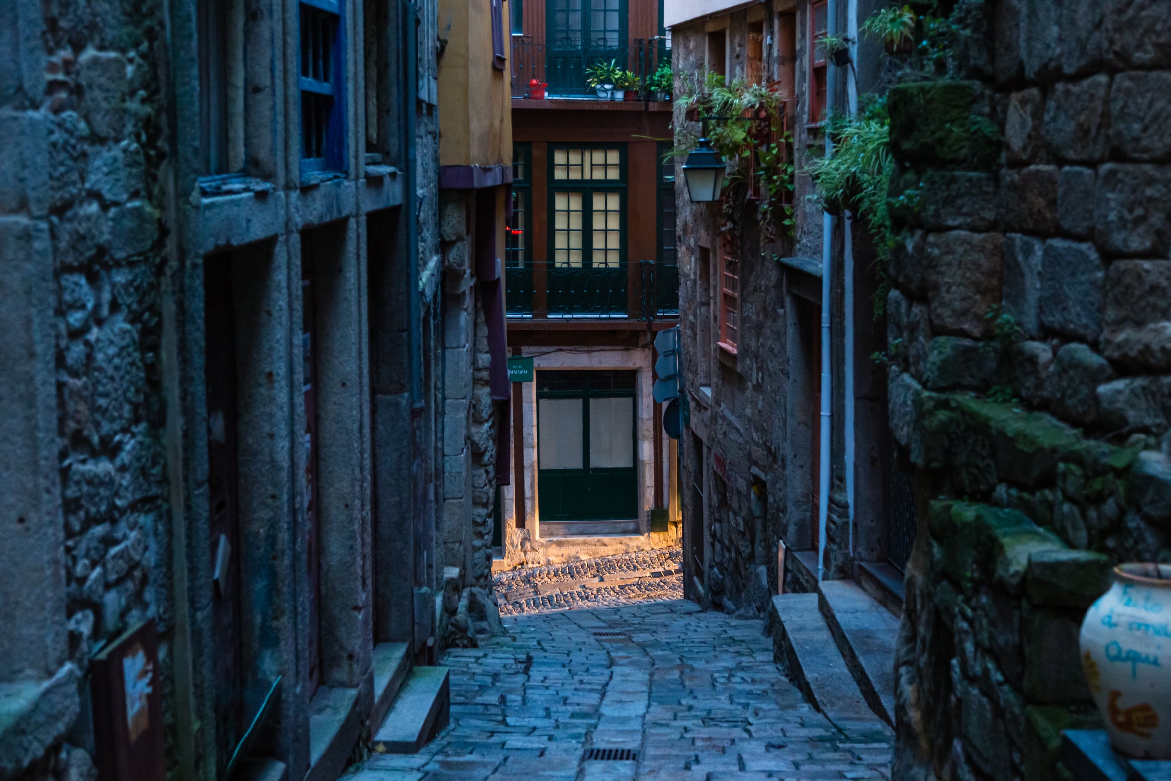 Narrow cobbled back street in the old town of Porto, Portugal, too tight for a car